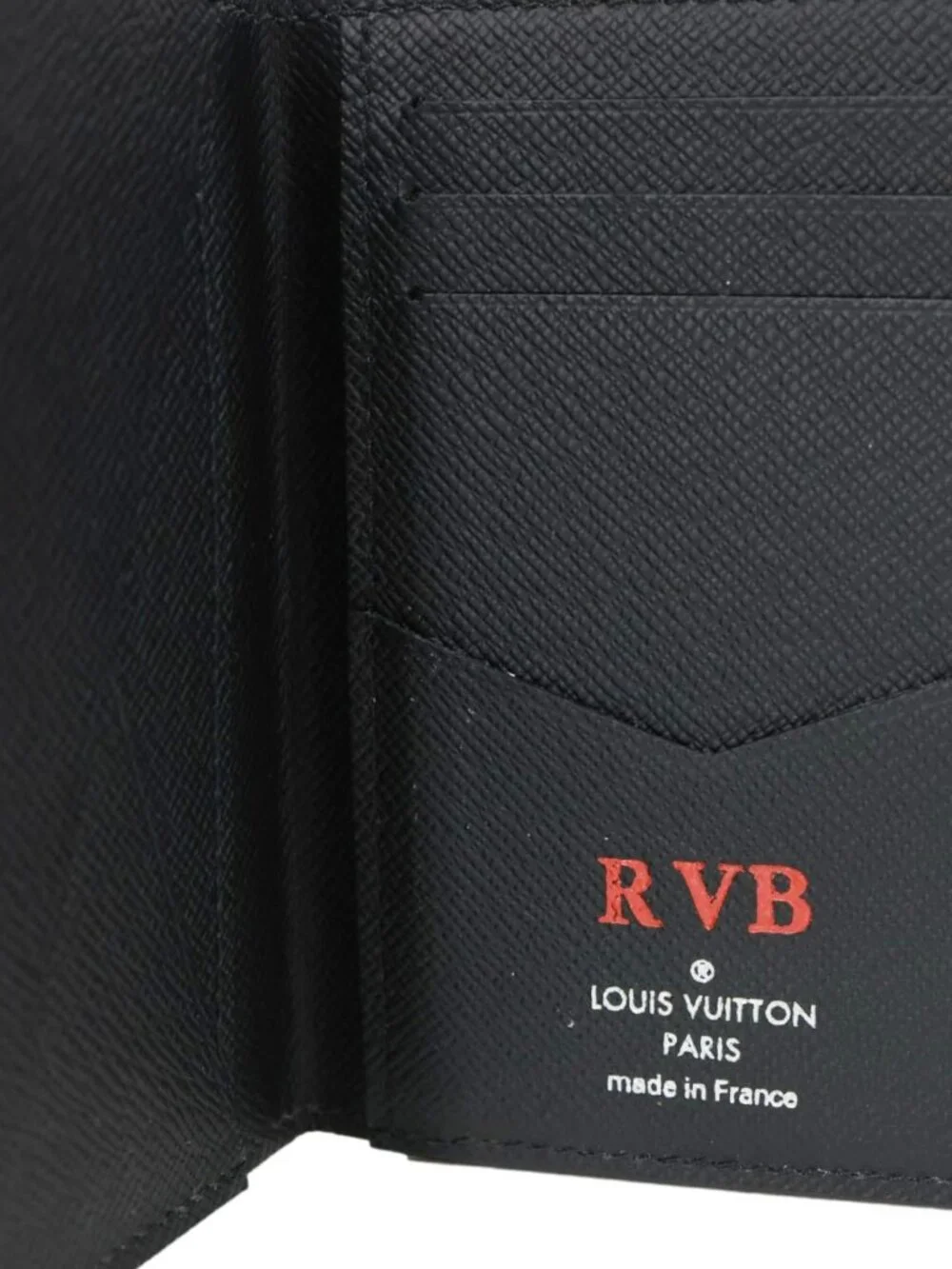 Louis Vuitton  Taiga Leather Bifold Wallet Black